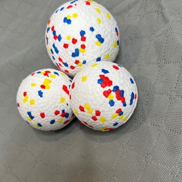 3 pack Vibrant Dog Play Balls with Red, Blue, and Yellow Accents 1 large 2 med - Picture 3 of 4
